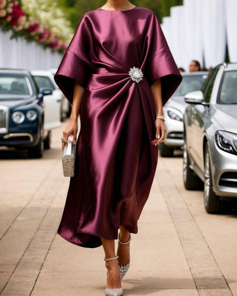 Abito lungo in raso luccicante di lusso