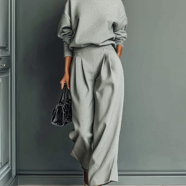 Completo pantalone largo e felpa grigio melange