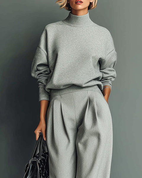 Completo pantalone largo e felpa grigio melange