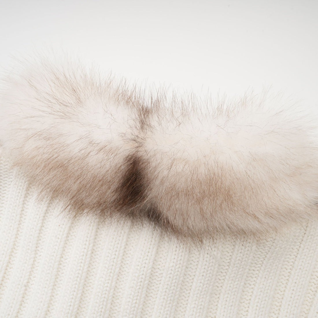 Cardigan con zip in pelliccia