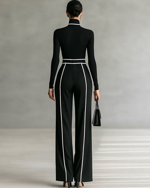 Completo due pezzi da donna con maglia a collo alto e pantaloni larghi con cintura