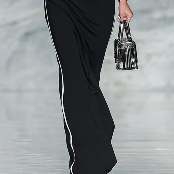 Abito lungo aderente con maniche lunghe