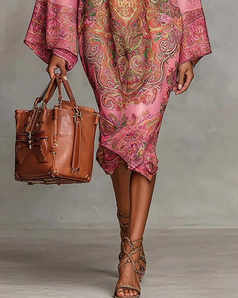 Abito ampio con maniche svasate e stampa floreale rosa