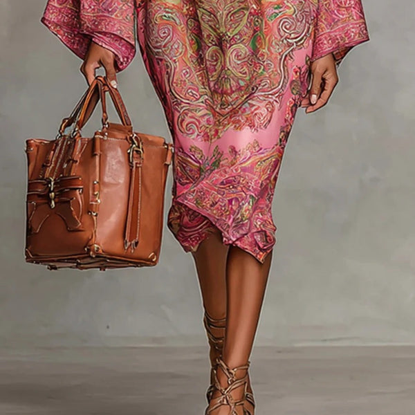 Abito ampio con maniche svasate e stampa floreale rosa