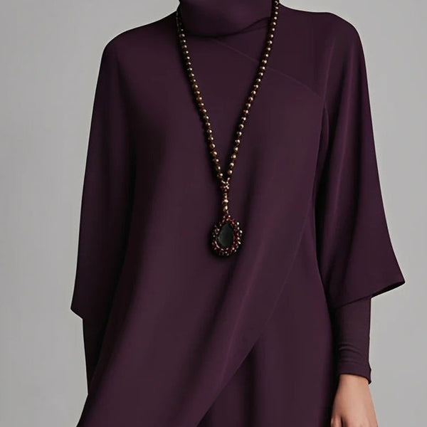 Abito lungo con collo alto ricamato