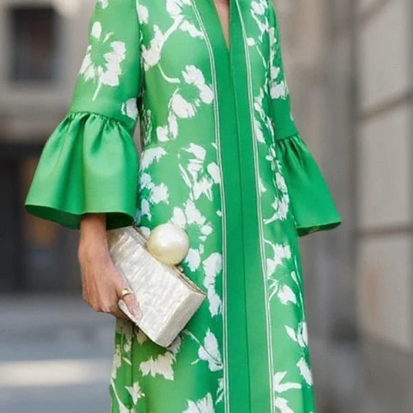 Abito ampio con maniche a campana e stampa floreale con spacco laterale